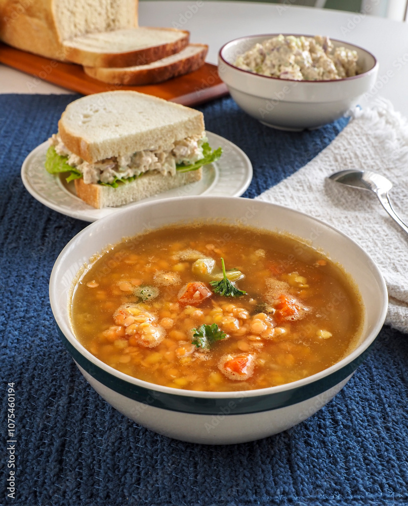 Lentil Soup and Chicken Salad Sandwich on Blue Vert Lentil Soup and Chicken Salad Sandwich on Blue Vert
