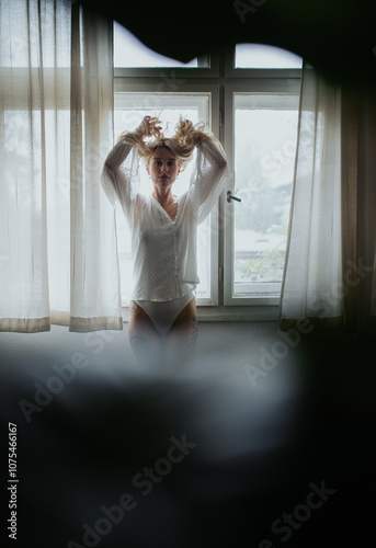 Woman posing by Window in Gentle Morning Light