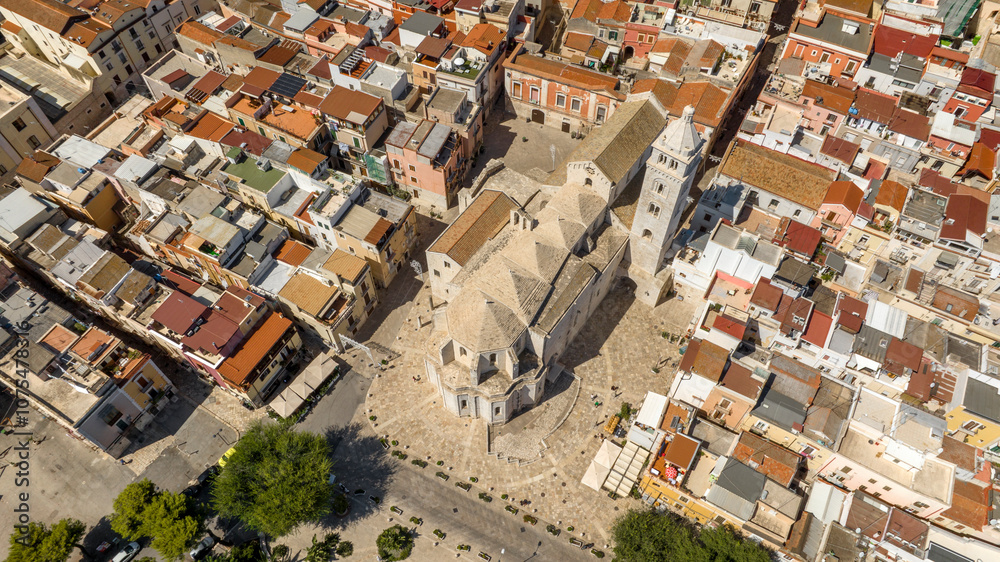 Fototapeta premium Aerial view of the Basilica of Santa Maria Maggiore in the historic center of Barletta Puglia, Italy. It is the cathedral of the city and it was built in Romanesque and Gothic styles.