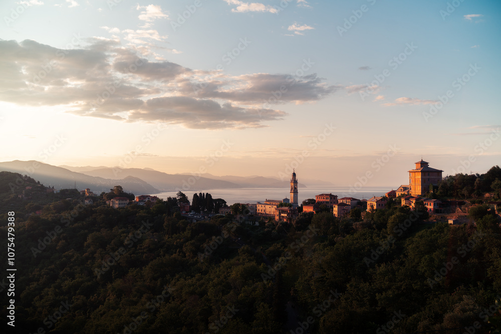 Italian riviera with town of San Lorenzo della Costa at sunrise, Liguria, Italy