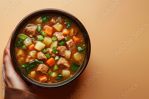 Obraz na płótnie Hearty Pork And Vegetable Miso Soup. Traditional Japanese Tonjiru Dish In Bowl. The Savory Broth Is Filled With Tender Pork Chunks, Potatoes, Carrots, And Green Onions w salonie
