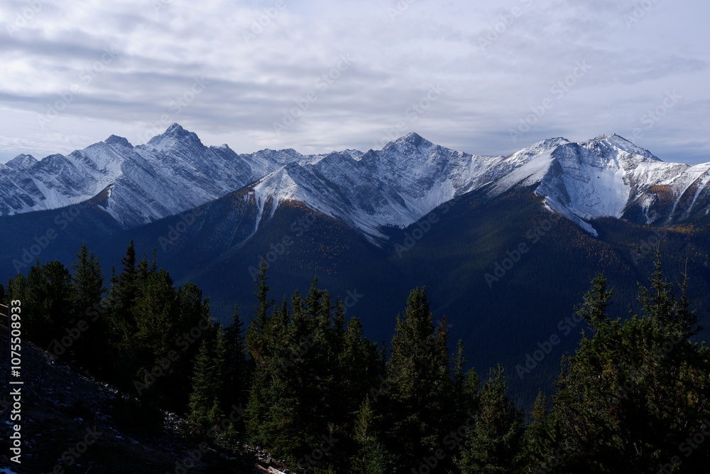Photo of the Sundance Range in the Canadian Rockies within Banff National Park in Alberta, Canada. Photo of the Sundance Range in the Canadian Rockies within Banff National Park in Alberta, Canada.