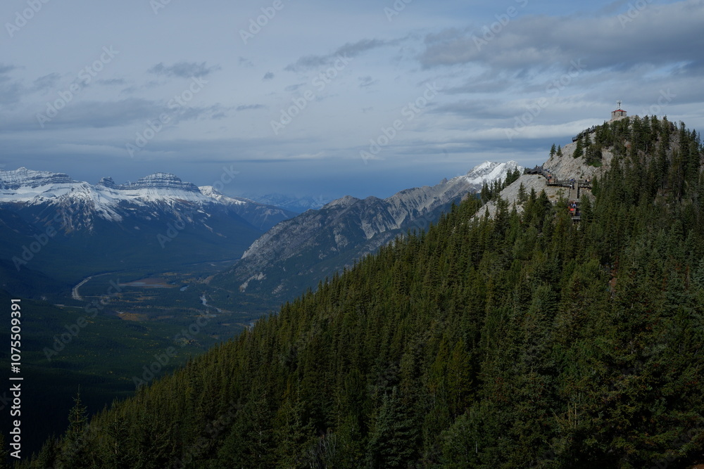 Photo of the Sundance Range in the Canadian Rockies within Banff National Park in Alberta, Canada. Photo of the Sundance Range in the Canadian Rockies within Banff National Park in Alberta, Canada.
