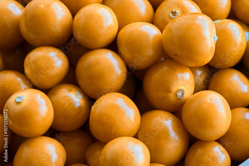 Golden and delicious! Fresh aguaymanto (goldenberry) packed with nutrients, flavor, and a burst of sunshine in every bite. Perfect for snacking, desserts, or adding that extra zest to your smoothies! photo