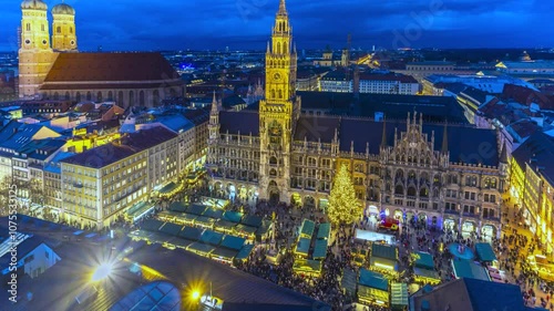 Munich Christmas Market Marienplazt Old Town Square with New Town Hall day to night transition timelapse hyperlapse. Neues Rathaus and Town Hall Clock Tower Glockenspiel. Munich skyline, Germany photo