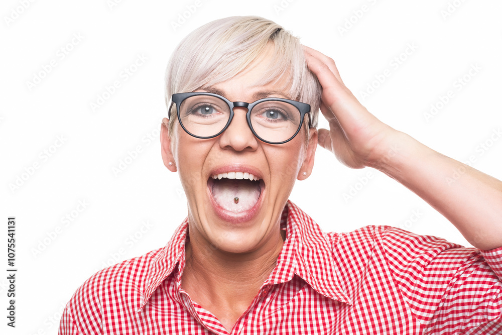 Closeup surprised face of adult woman, isolated on white background. Amazing middle aged woman yelling. Head shot of a amazed woman. Closeup surprised face of adult woman, isolated on white background. Amazing middle aged woman yelling. Head shot of a amazed woman.