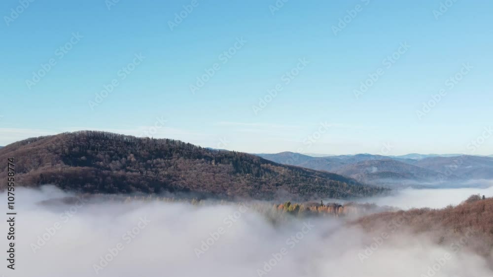 Inspiring and mesmerizing calm tranquil shot of flying. Outdoors lifestyle for healthy and fresh air. Amazing inspirational epic drone footage of mountains peak with foggy on sunny autumn day Inspiring and mesmerizing calm tranquil shot of flying. Outdoors lifestyle for healthy and fresh air. Amazing inspirational epic drone footage of mountains peak with foggy on sunny autumn day