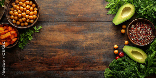 wooden table top with space for text with avocado and chickpeas