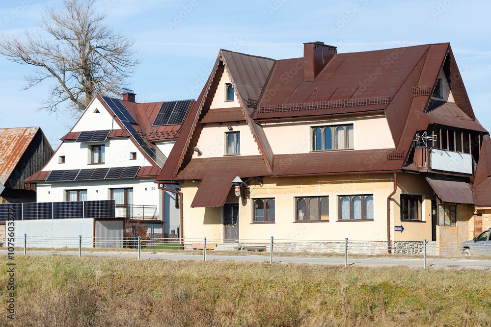 RDZAWKA, POLAND - NOVEMBER 08, 2024: Modern highland houses for multi-generational families in Rdzawka in Podhale, Poland. RDZAWKA, POLAND - NOVEMBER 08, 2024: Modern highland houses for multi-generational families in Rdzawka in Podhale, Poland.