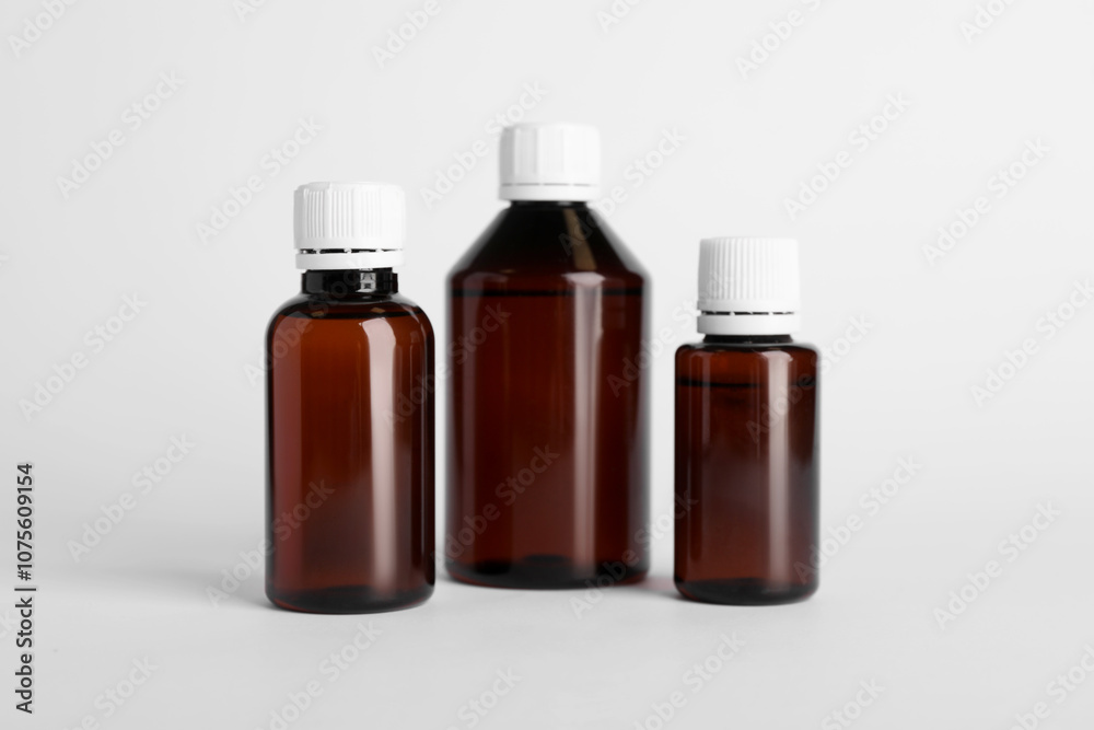 Medical bottles with medicine on white background Medical bottles with medicine on white background
