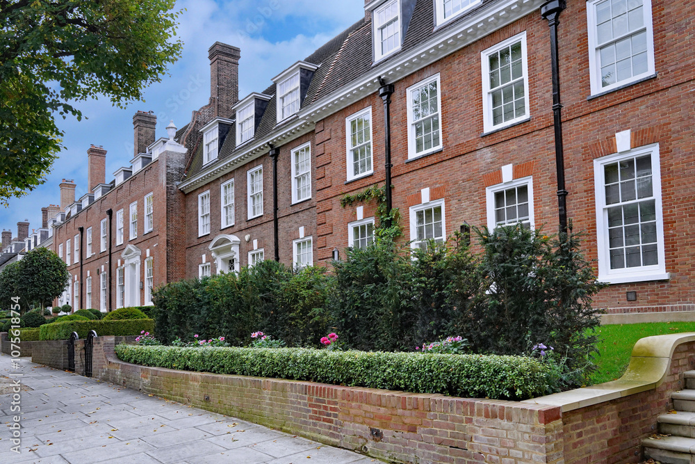 Row of Georgian style brick townhouses in London, England Row of Georgian style brick townhouses in London, England
