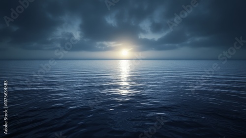 A calm ocean with a beautiful sunset in the background