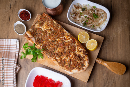 Turkish and Arabic Traditional Ramadan Bread Sliced Etli Ekmek or Pide photo