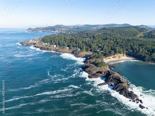 The Pacific Ocean washes against the rocky and rugged coastline of Oregon, not far south of Lincoln City. This part of the Pacific Northwest coast is incredibly scenic and accessed from highway 101.