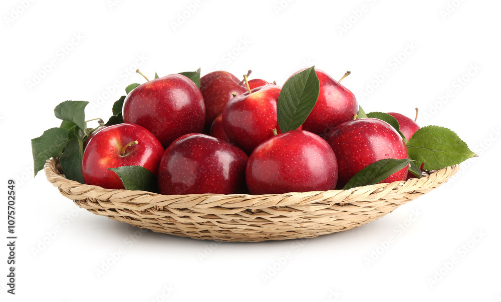 Fresh ripe red apples in wicker bowl isolated on white Fresh ripe red apples in wicker bowl isolated on white