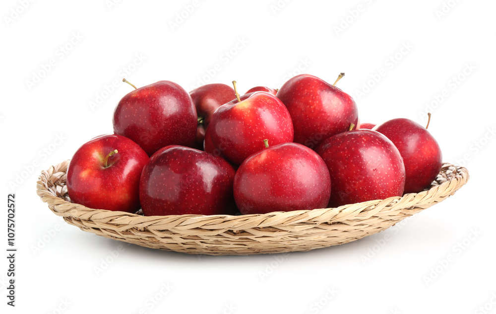 Fresh ripe red apples in wicker bowl isolated on white Fresh ripe red apples in wicker bowl isolated on white