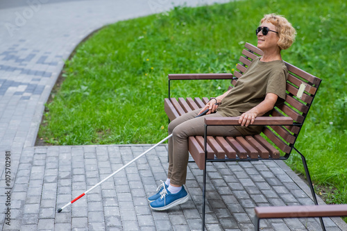 Wallpaper Mural An elderly blind woman sits on a bench in the park. Torontodigital.ca