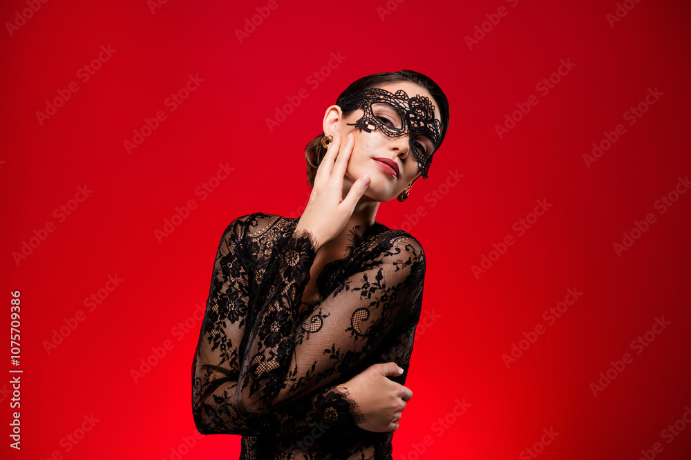 Photo of sexy young girl touch face sensual dressed black dress mask halloween vip party red color background Photo of sexy young girl touch face sensual dressed black dress mask halloween vip party red color background