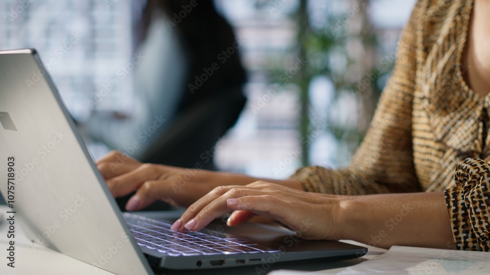 Confident skilled entrepreneur seated at her corporate office desk, is deep in her thoughts using laptop to forecast business growth. Managing financial planning and achieving goals. Camera A. Confident skilled entrepreneur seated at her corporate office desk, is deep in her thoughts using laptop to forecast business growth. Managing financial planning and achieving goals. Camera A.