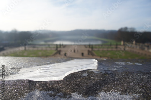 Piece of ice on top of a wall with the view of the 