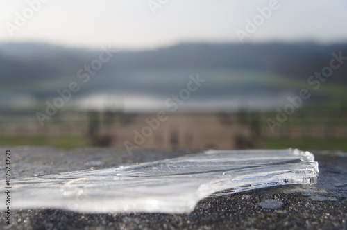 Piece of ice on top of a wall with the view of the 