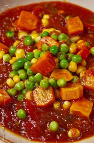 tomato soup with peas and carrots