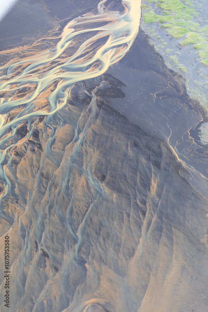 Fototapeta premium Glacial River in Iceland from above, top view, beautiful glacial runoff, mineral river