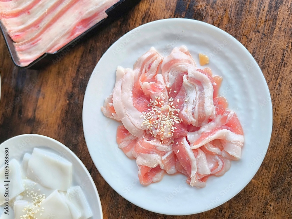 Sliced raw pork and seafood set for mookata, bbq, yakiniku and shabu. Pork belly Sliced raw pork and seafood set for mookata, bbq, yakiniku and shabu. Pork belly