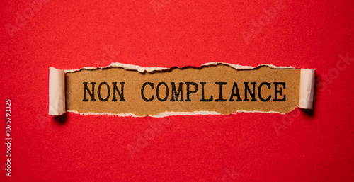 Text NON COMPLIANCE on envelope on the keyboard photo