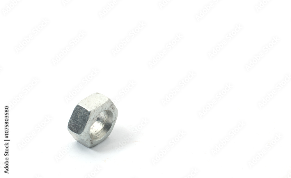A nut seen sideways on a white background A nut seen sideways on a white background