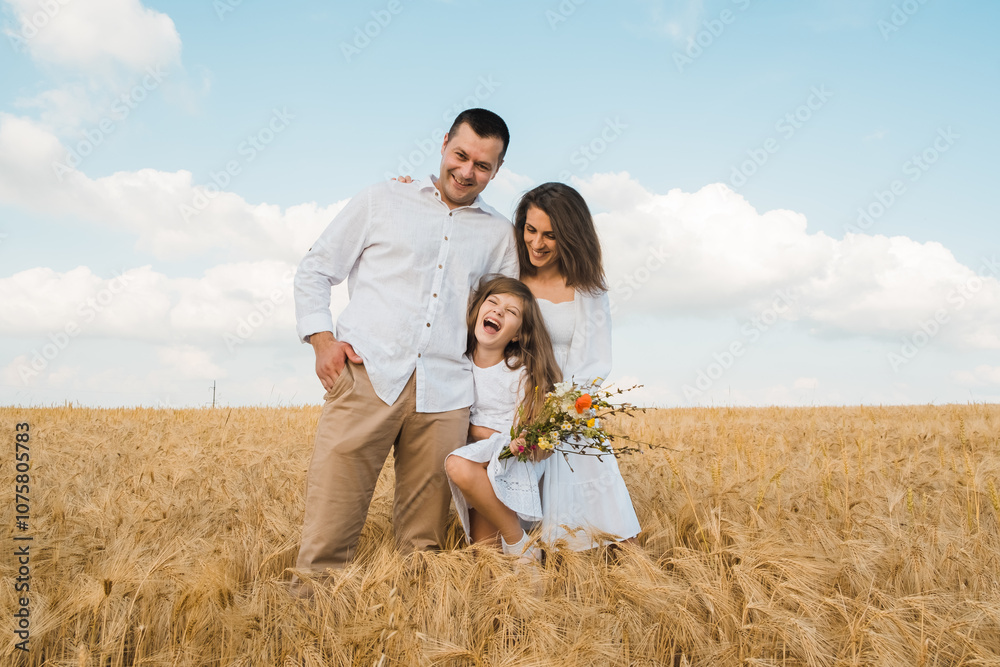 Happy family of farmers with children runs through wheat field. Mother, father, little daughter,enjoy sunset, dream of flying. Mom dad baby walk together in nature, sun. Kids. Happy family of farmers with children runs through wheat field. Mother, father, little daughter,enjoy sunset, dream of flying. Mom dad baby walk together in nature, sun. Kids.