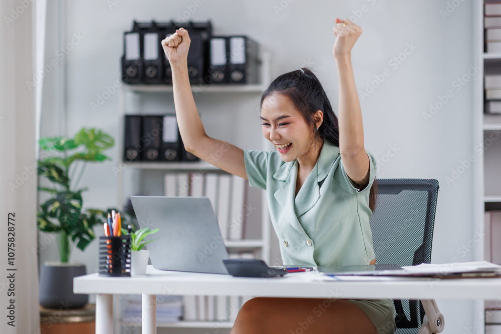 Happy Asian Business woman using calculator and laptop for doing math finance on an office desk, tax, report, accounting, statistics, and analytical research concept
Happy Asian Business woman using calculator and laptop for doing math finance on an office desk, tax, report, accounting, statistics, and analytical research concept