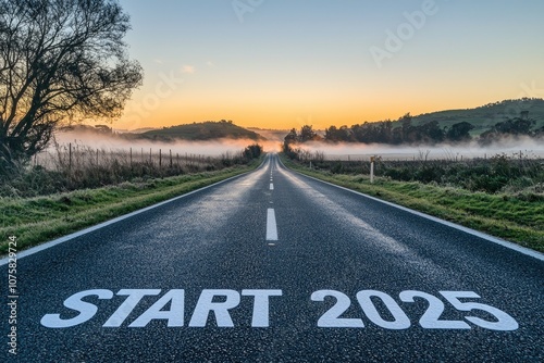 Open Road Leading to a New Beginning at Dawn With START 2025 Text Marked on the Asphalt Surrounded by Misty Fields and Sunrise Glow