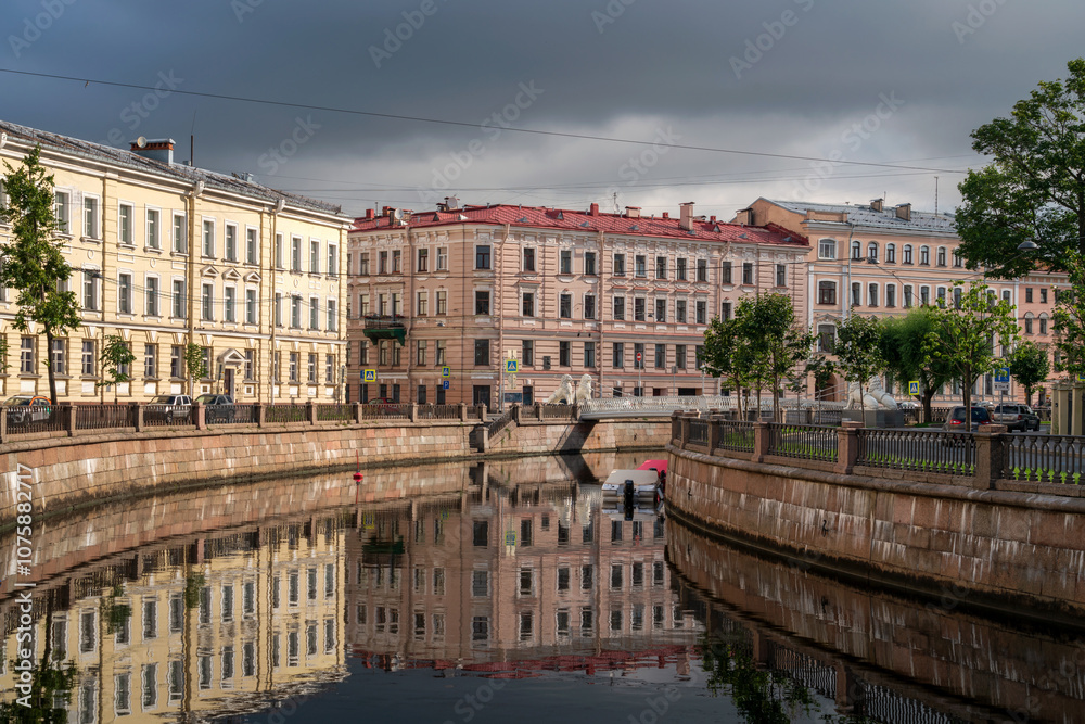 View of the Lion Bridge across the Griboyedov Canal on a sunny summer day, St. Petersburg, Russia View of the Lion Bridge across the Griboyedov Canal on a sunny summer day, St. Petersburg, Russia
