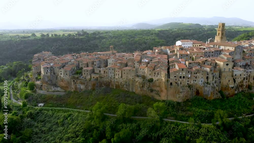 Aerial view of Pitigliano town, located on a volcanic tufa ridge, Tuscany, Italy Aerial view of Pitigliano town, located on a volcanic tufa ridge, Tuscany, Italy