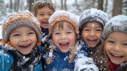 Five happy children enjoying a snowy day in winter wonderland