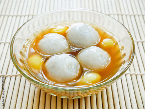 Sweet glutinous rice balls filled with black sesame seeds photo