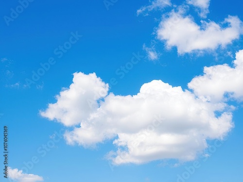 Clear blue sky with fluffy white clouds, perfect for background or texture, peaceful, fluffy clouds, atmosphere