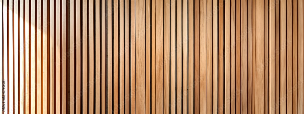 Wooden wall background with vertical slats, texture of natural wood paneling for interior design or backdrop. Wooden paneling wall. Wooden wall background with vertical slats, texture of natural wood paneling for interior design or backdrop. Wooden paneling wall.