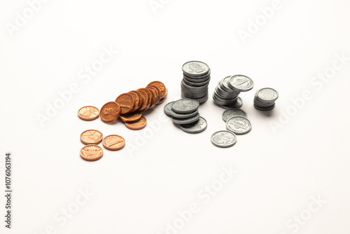 US coin ascending like a bar graph isolated on white table