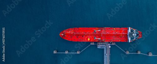 Obraz na płótnie Oil tanker ship at industrial oil and gas depot terminal port, Business logistic oil and gas by tanker ship storage tank chemical petroleum petrochemical refinery industrial, Oil and gas tanker ship. w salonie