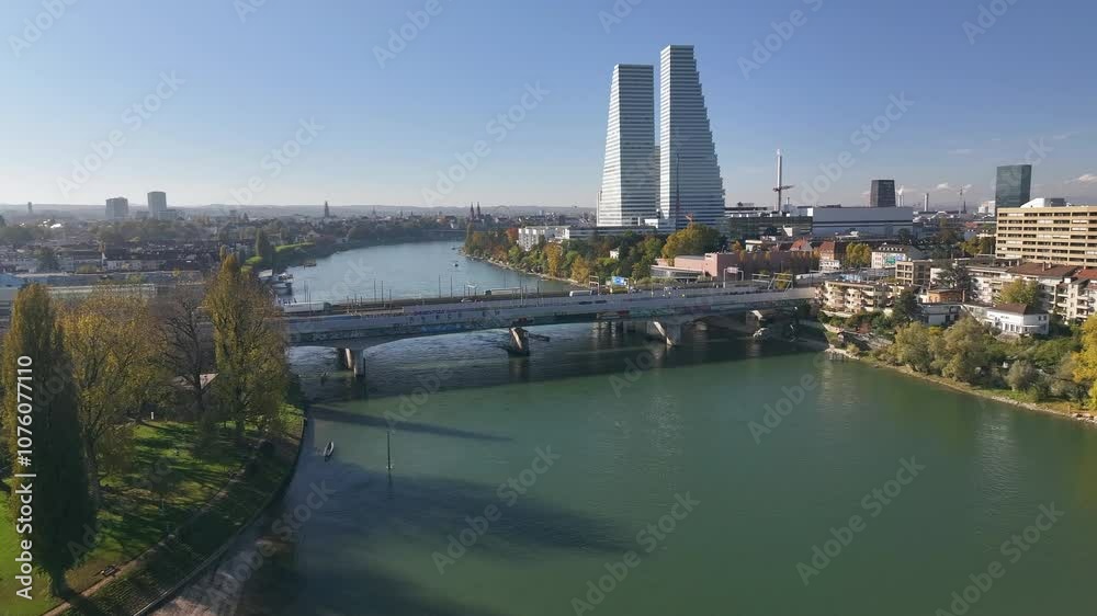 Basel in autumn with rhine river and cityscape featuring roche towers, aerial view Basel in autumn with rhine river and cityscape featuring roche towers, aerial view