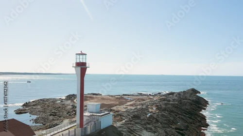 Cape Forchu Lighthouse in Canada, Nova Scotia on the Atlantic Ocean photo