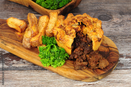 British beef pie meal, dry aged beef mince and shin meat with all butter pastry, chunky skin on chips and broccoli