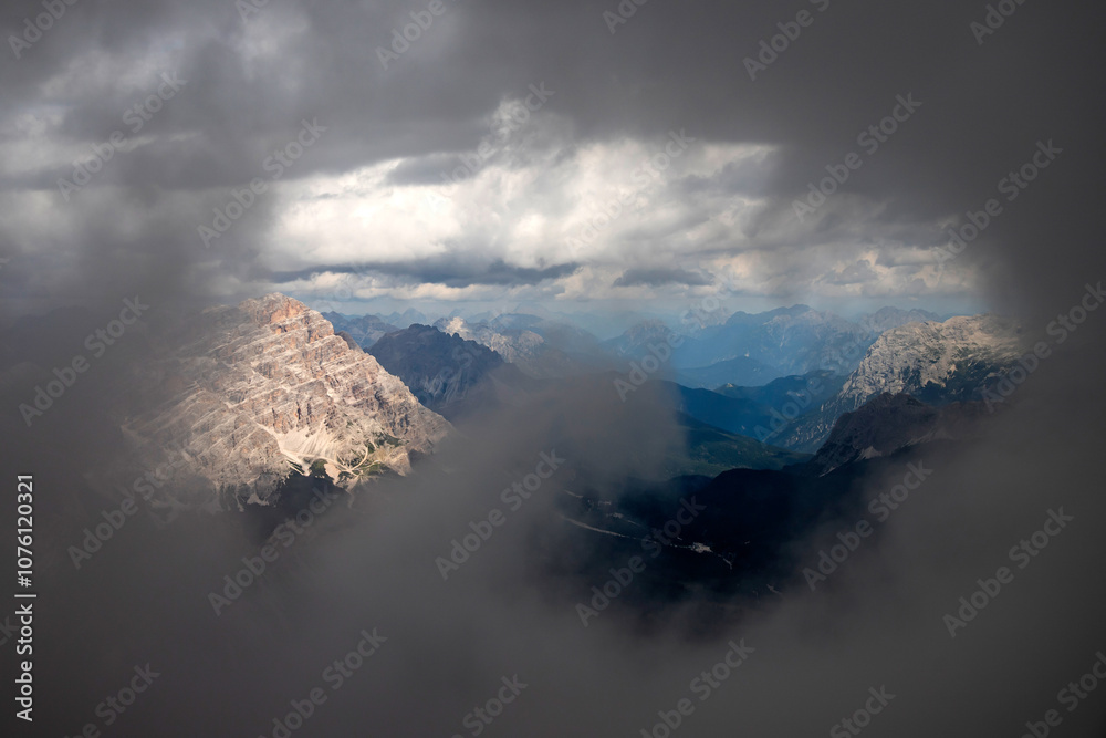 Tofana di Mezzo view over Dolomites mountain range. Tofana di Mezzo view over Dolomites mountain range.