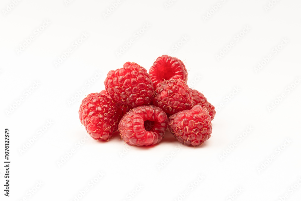 Tasty fresh raspberry isolated on a white background. Top view. Tasty fresh raspberry isolated on a white background. Top view.