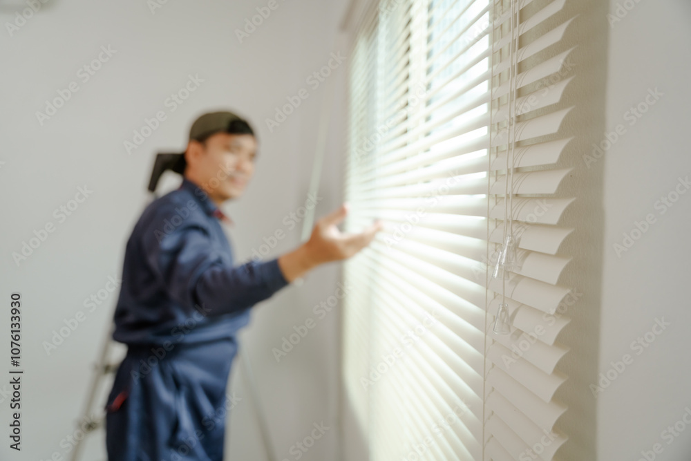 A technician installing blinds with automated energy-saving features, eco-conscious materials, and minimalist decor. A technician installing blinds with automated energy-saving features, eco-conscious materials, and minimalist decor.