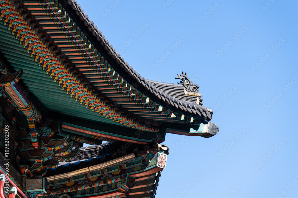 painted eaves of the traditional Korean building in the Buddhist temple building painted eaves of the traditional Korean building in the Buddhist temple building