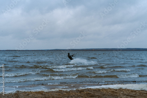 Kite surfer on the lake photo