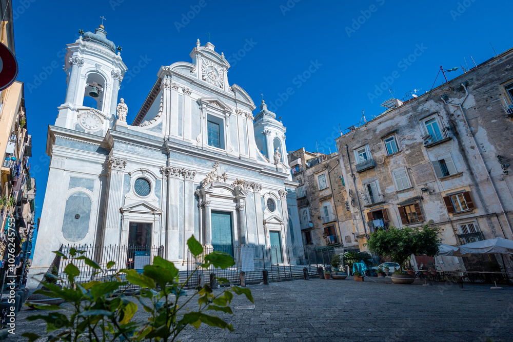 Obraz premium Girolamini church in front of Girolamini square on the via dei tribunali in Napoli, italy. Warm sunny autumn day with blue skies above